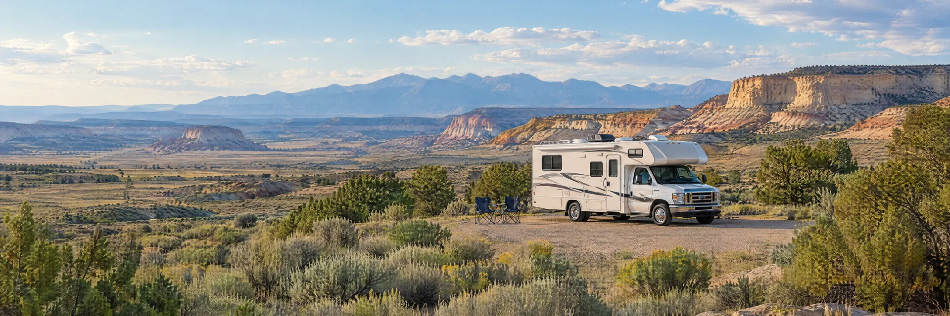 Illustration of a Class C motorhome at a fictional camping setting inspired by VERNAL, UT.