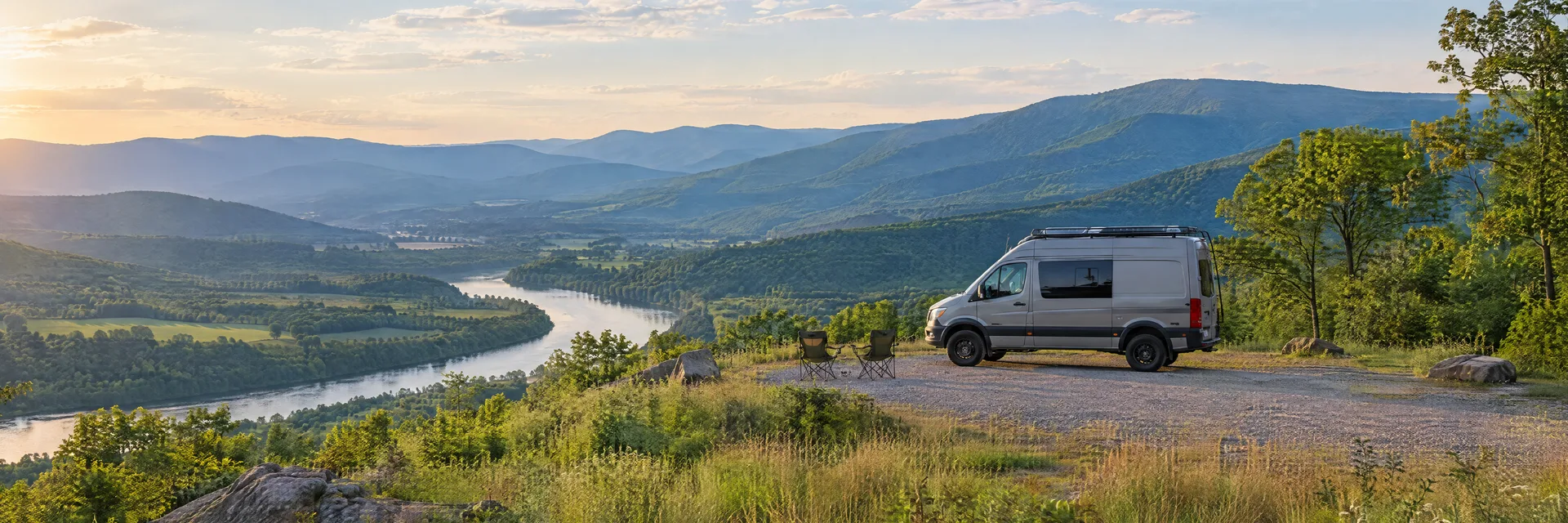 Illustration of a camper van at a fictional camping setting inspired by Front Royal, VA.