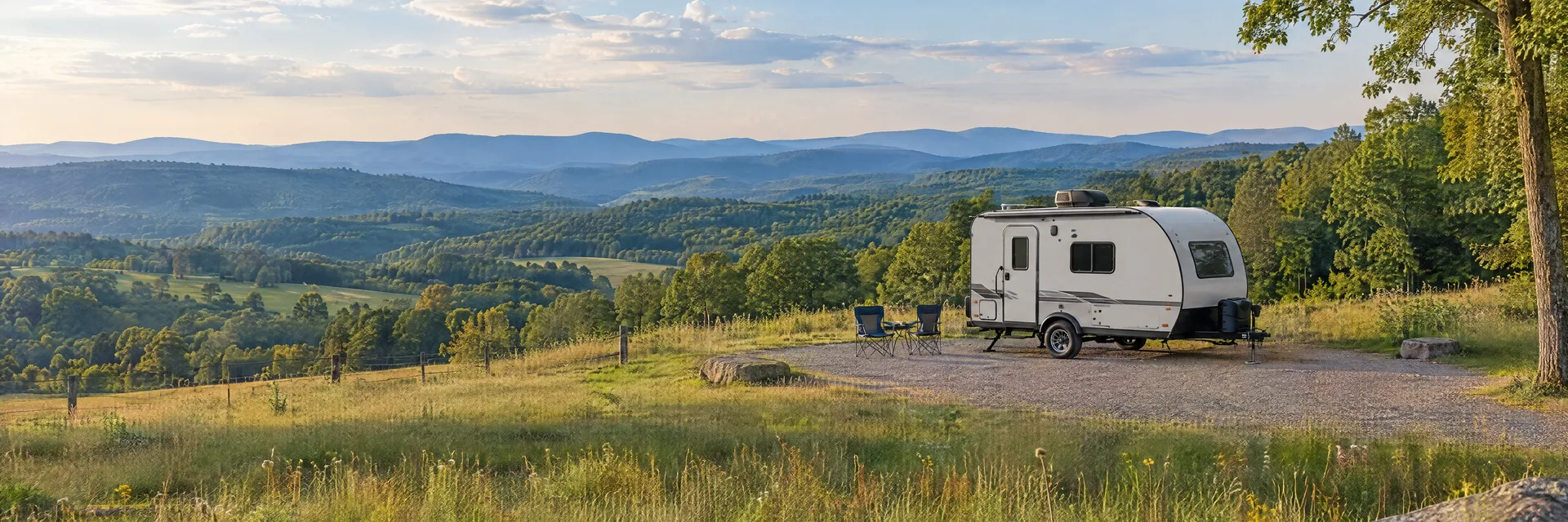 Illustration of a compact travel trailer at a fictional camping setting inspired by Winchester, VA.