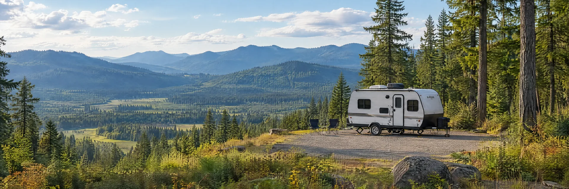 Illustration of a compact travel trailer at a fictional camping setting inspired by Morton, WA.