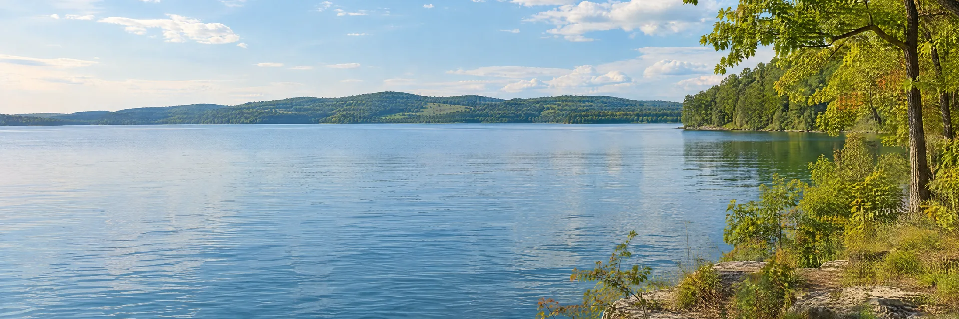 Illustration inspired by Green Lake, WI: wisconsin freshwater lake with oak and maple shoreline and gentle green hills.