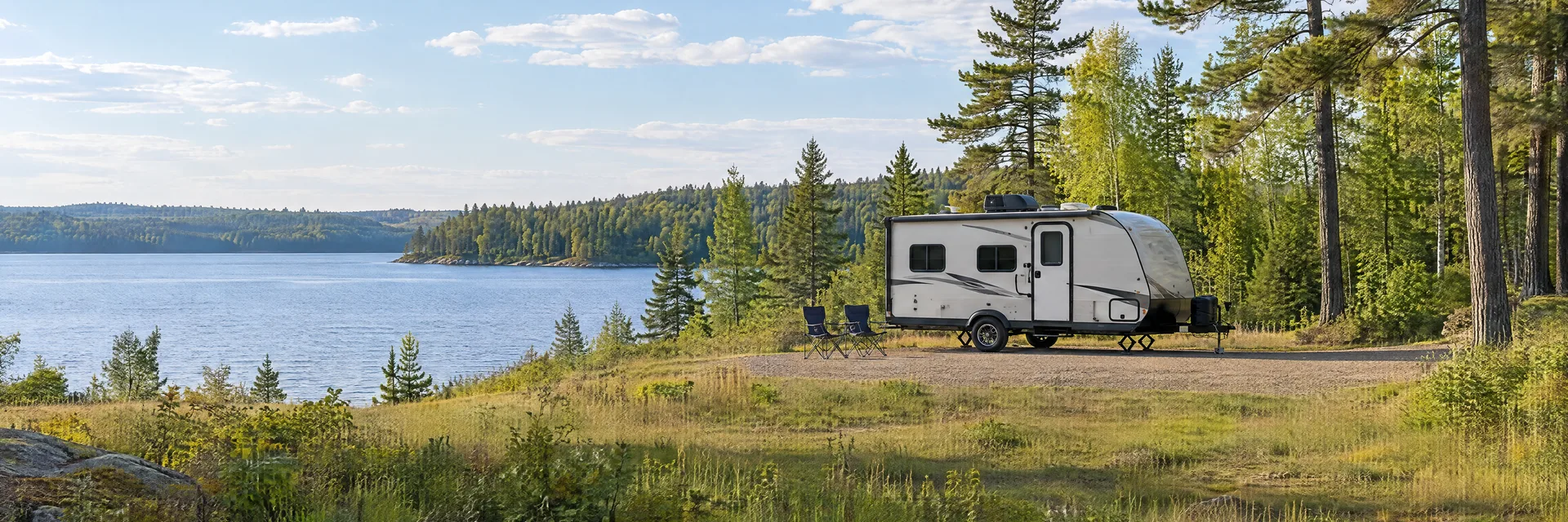 Illustration of a compact travel trailer at a fictional camping setting inspired by Medford, WI.