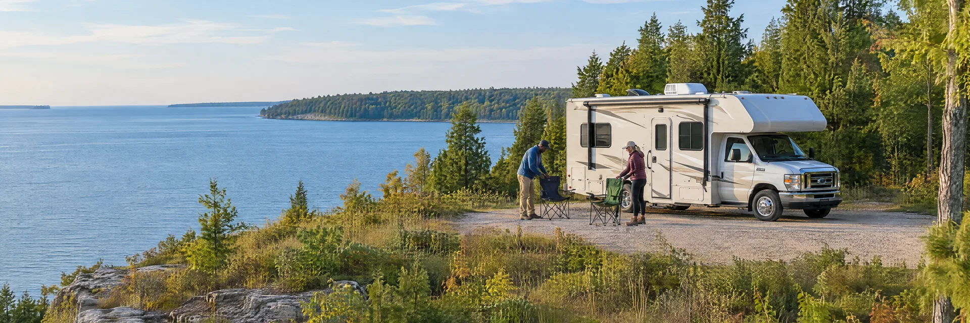 Illustration of campers enjoying setting up camp beside a Class C motorhome in a fictional camping setting inspired by Sturgeon Bay, WI.
