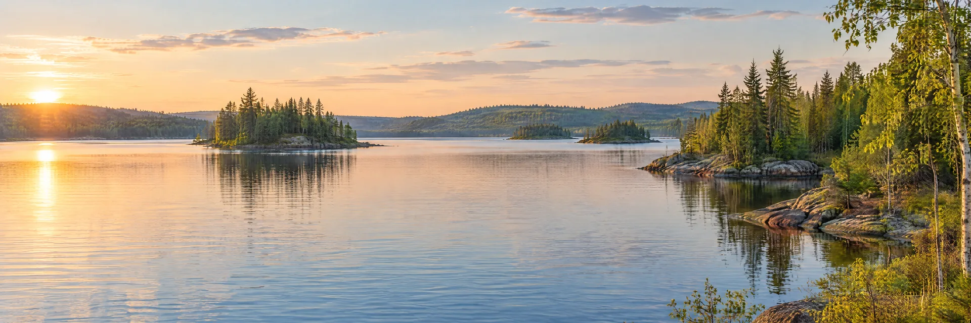 AI-generated illustration inspired by Crooked Lake: northern freshwater lake, low rocky shoreline with evergreen and birch forest, small wooded islands and gentle rolling terrain.