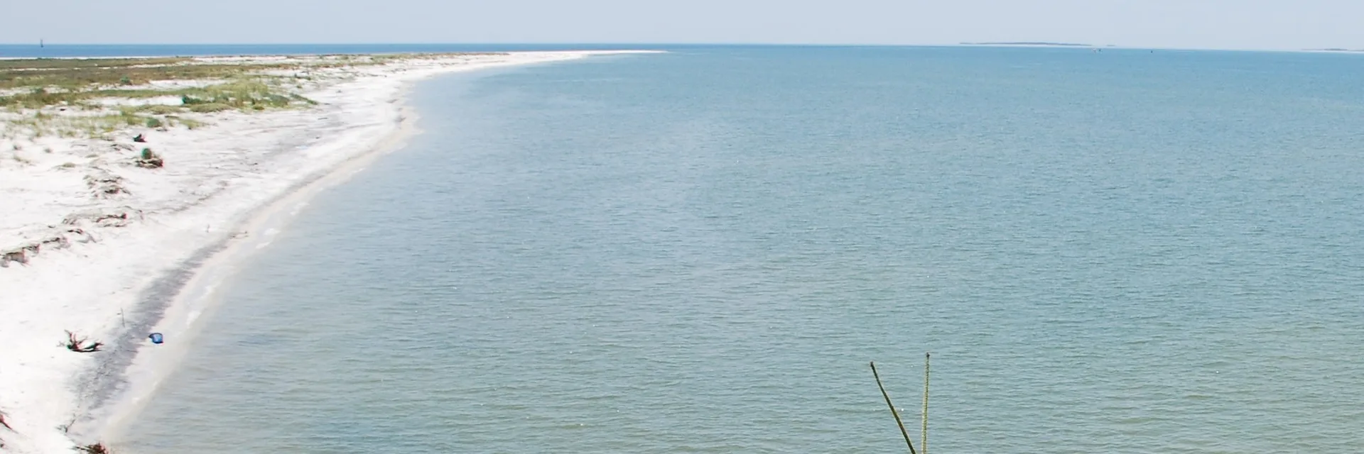 White sand barrier island and coastal vegetation at Gulf Islands National Seashore.
