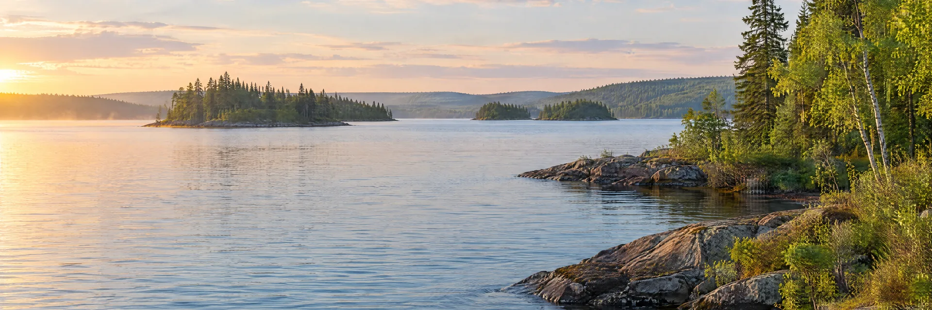 AI-generated illustration inspired by Lake Gogebic: northern freshwater lake, low rocky shoreline with evergreen and birch forest, small wooded islands and gentle rolling terrain.