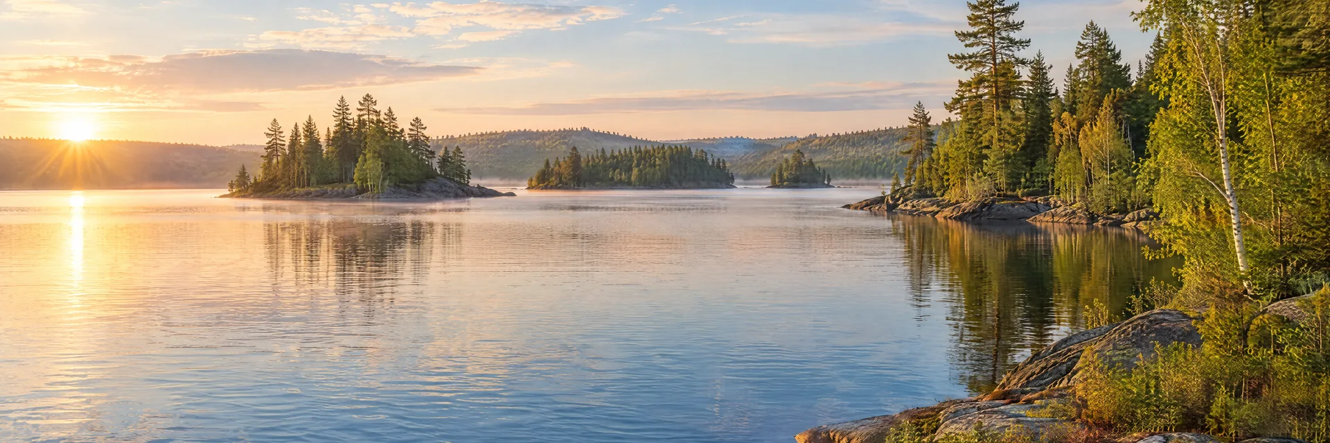AI-generated illustration inspired by Lake Vermilion: northern freshwater lake, low rocky shoreline with evergreen and birch forest, small wooded islands and gentle rolling terrain.