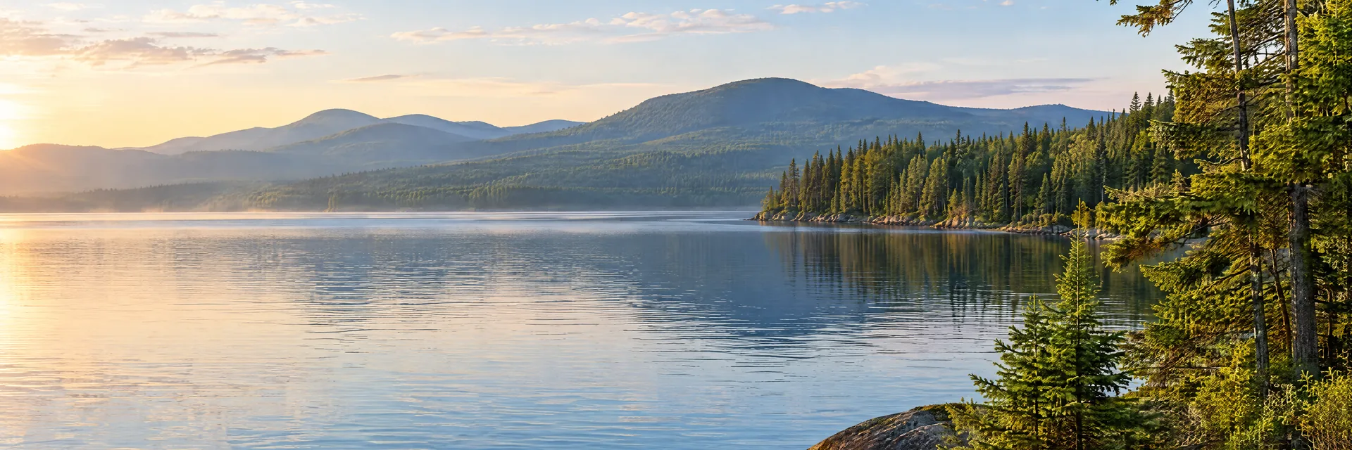AI-generated illustration inspired by Moosehead Lake: Maine wilderness lake, evergreen shoreline and rounded distant wooded mountains.