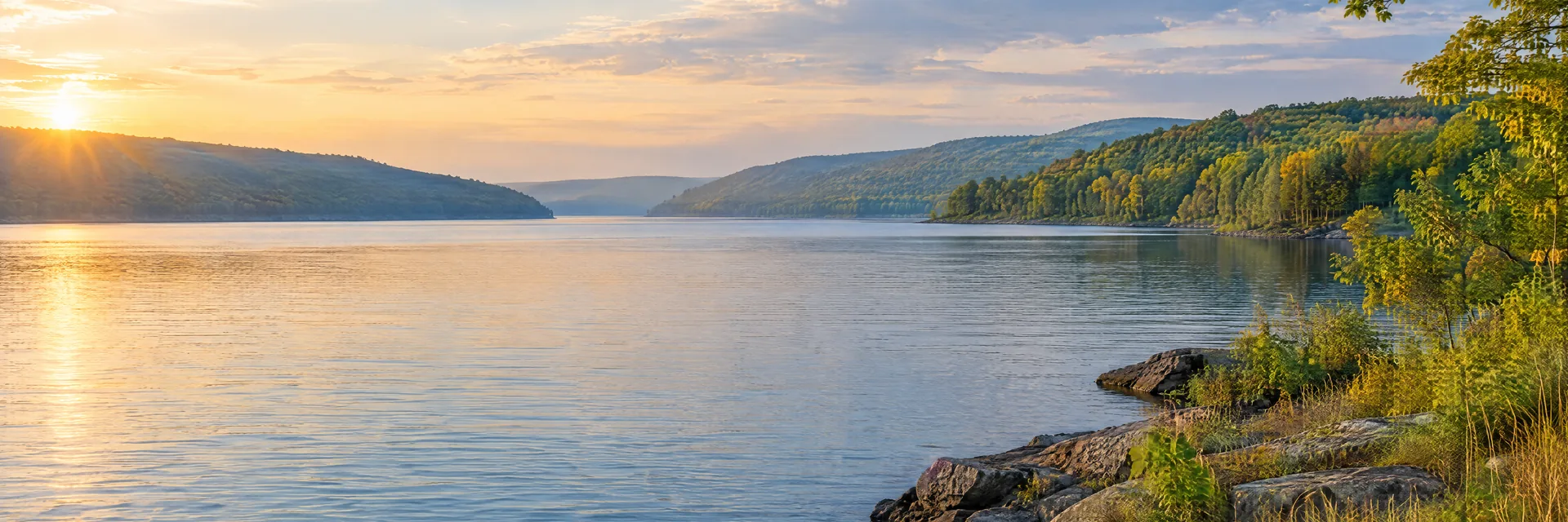 AI-generated illustration inspired by Seneca Lake: northeastern freshwater lake with rolling wooded hills, mixed deciduous forest, natural rocky and grassy banks.