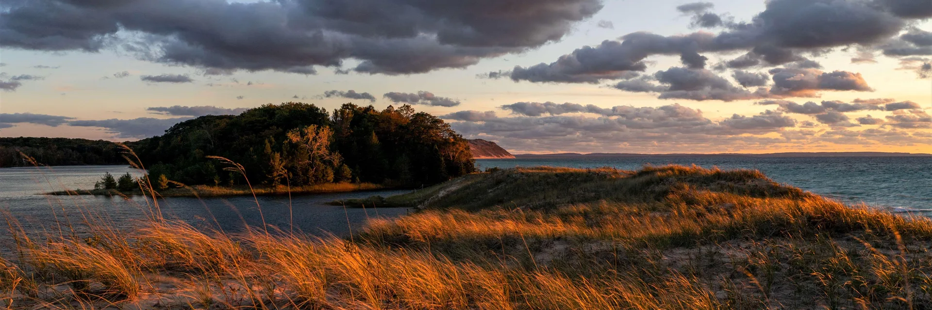 Dunes and North Bar Lake at sunset at Sleeping Bear Dunes National Lakeshore.