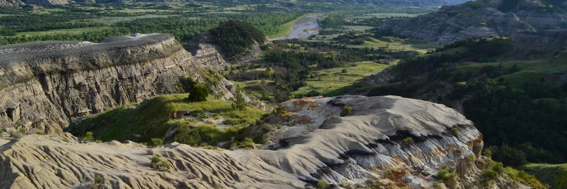 Striped buttes and green badlands in Theodore Roosevelt National Park.