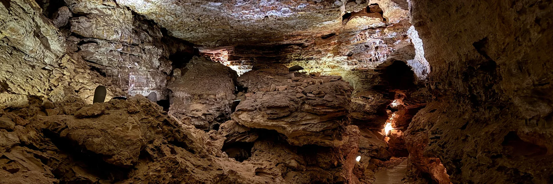 Textured limestone walls and ceiling formations inside Wind Cave National Park.