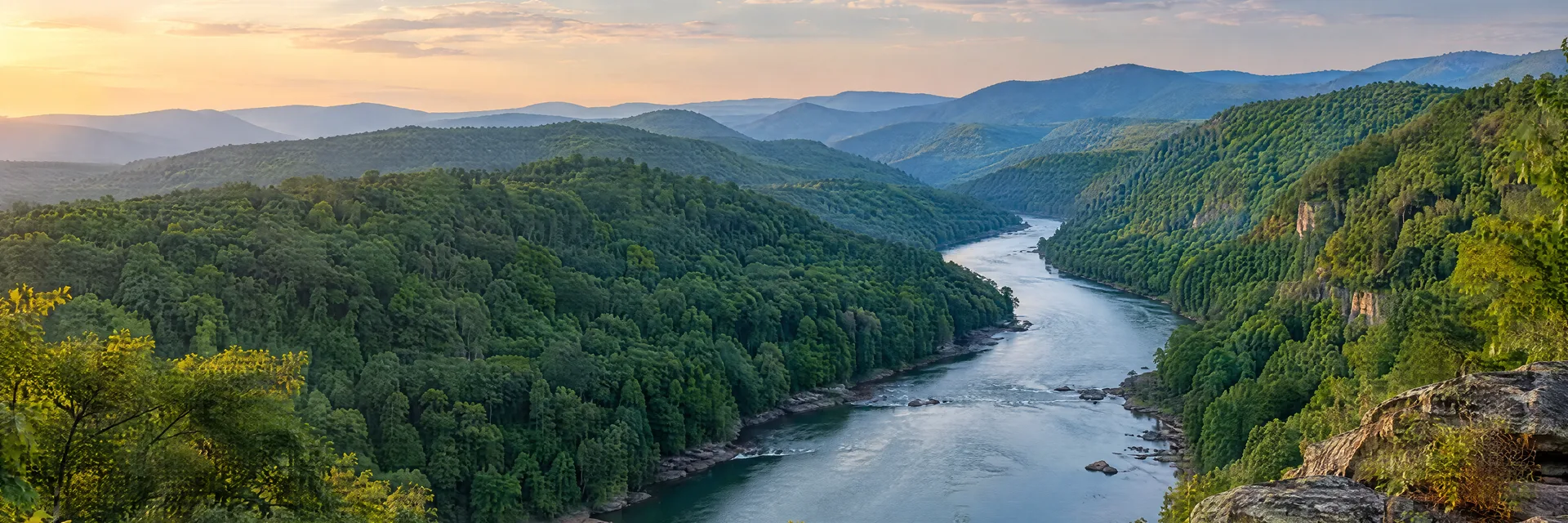 Illustration of representative natural scenery in West Virginia: appalachian river gorge, dense hardwood forest and layered wooded ridges.